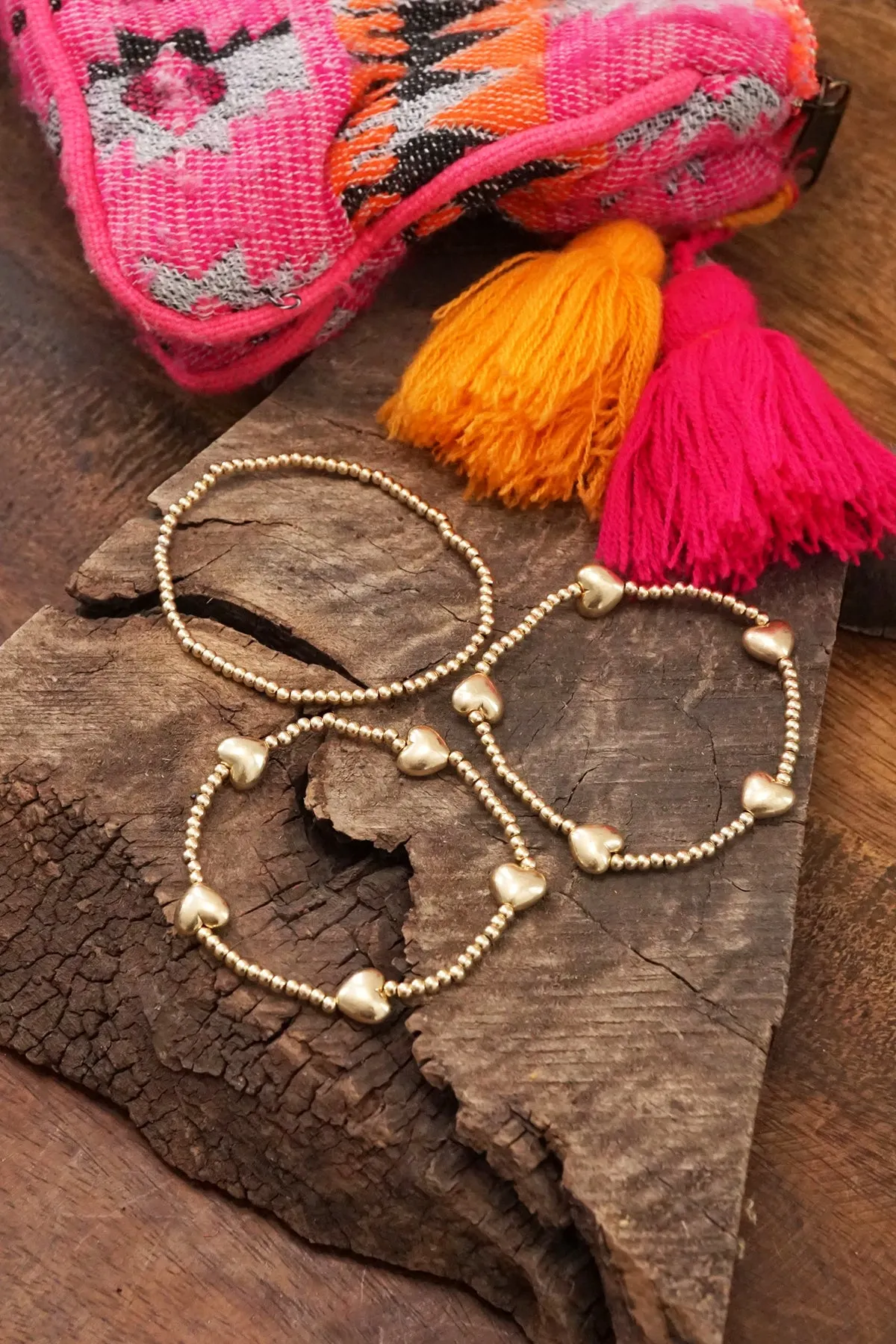 Heart bracelets stack set of 3 in worn gold tone