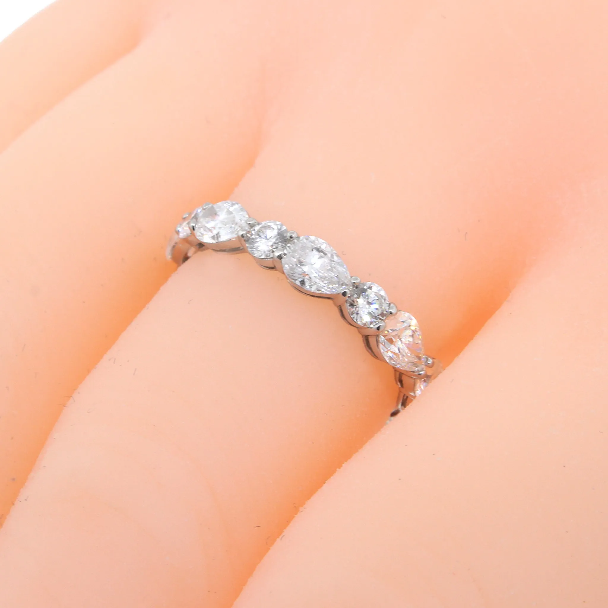 Platinum Pear Shaped and Round Diamond Wedding Band