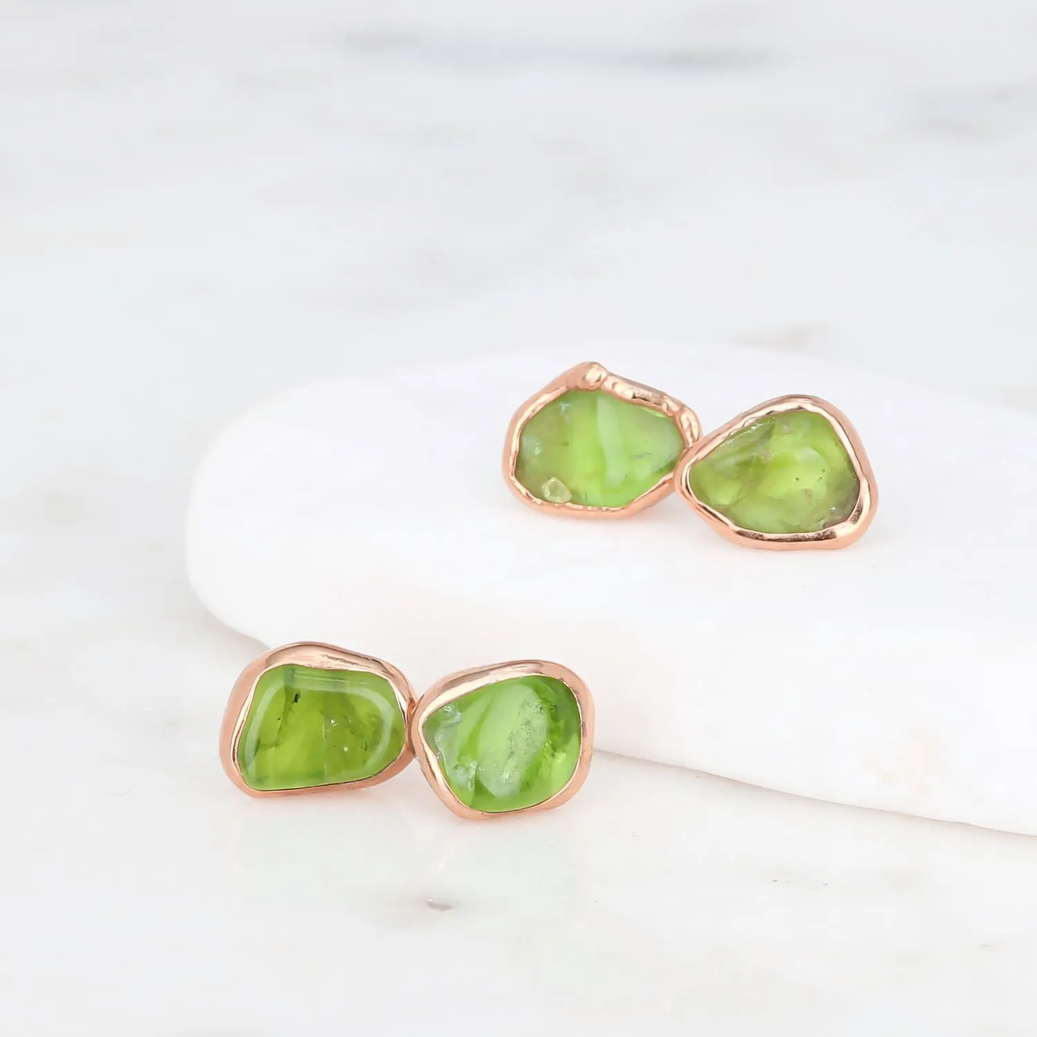 Raw Peridot Stud Earrings in Yellow Gold